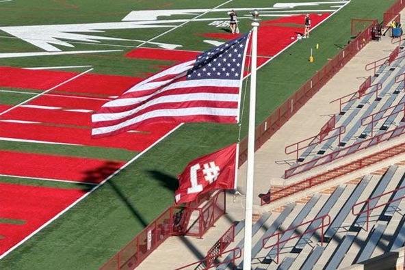 USA flag with #1 flag at DU's soccer field